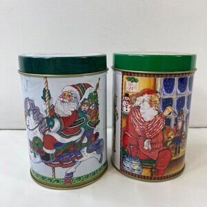 Set Of 2 Vintage Christmas Santa Claus Carousel Window Tin Canisters With Lids